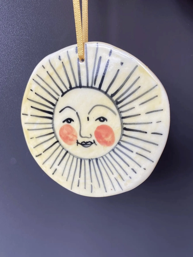 Hand-Painted Porcelain Sun Hanging Decoration