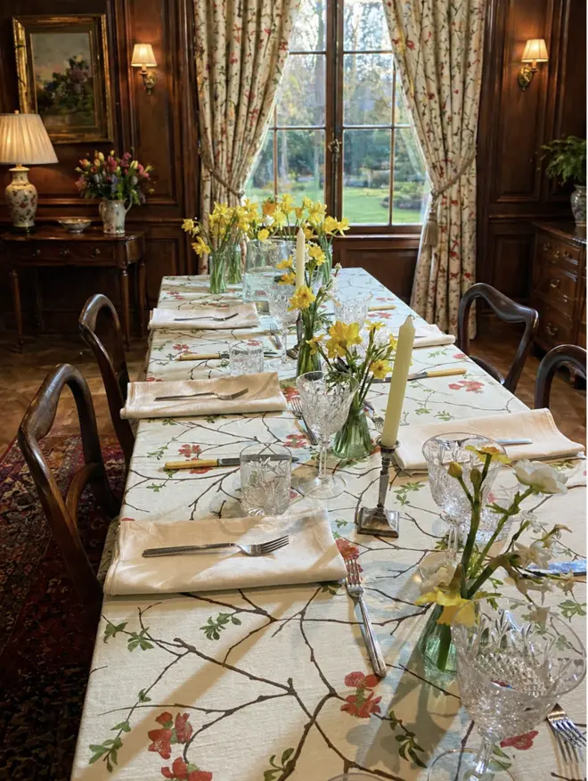 Crab apple floral tablecloth covers in hand painted red flowers, perfect to decorate a summer or winter table