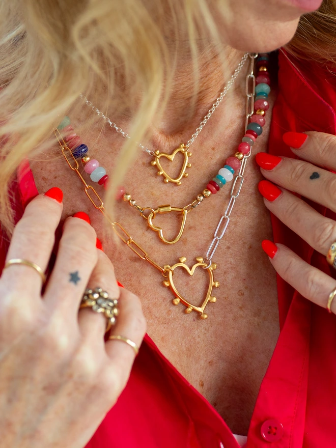 The Mini Studded Heart Necklace features a softly textured heart charm suspended from a classic belcher chain for effortless everyday wear. Crafted in mixed metals, this delicate heart necklace is perfect for layering or styling solo. A meaningful keepsake designed to celebrate love, connection and individuality.