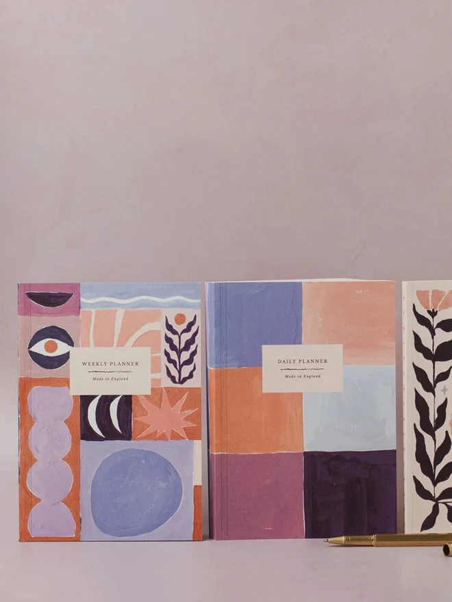 Colour Study Daily Planner standing with other Sister Paper Co planners