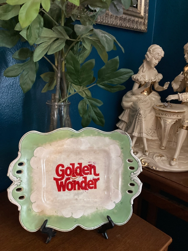 Beautiful rectangular vintage plate featuring a red Golden Wonder logo in the centre.