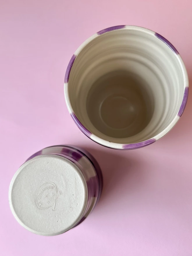     Ceramic tumbler showing inside and base