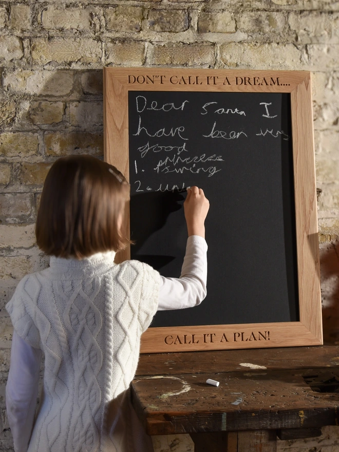 Notice Board and child writing