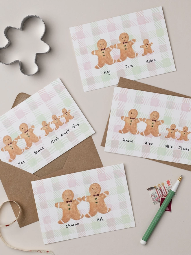 Gingerbread People Christmas Cards set on watercolour painted gingham check background