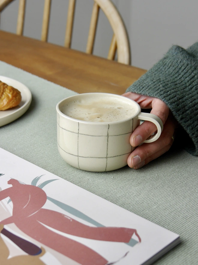 Small handmade grid pattern mug