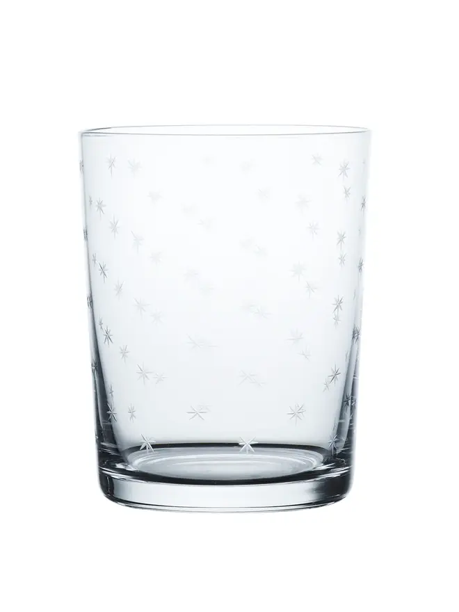engraved stars large crystal tumblers (set of 4). a large drinks glass patterned with small stars.
