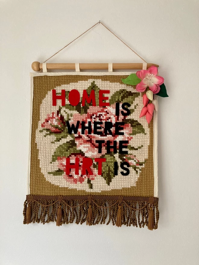Vintage tapestry pennantwith the words Home Is Where The HRT Is