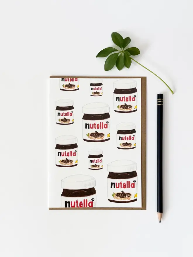 nutella jars illustrated card. card photographed on plain white bakcground.