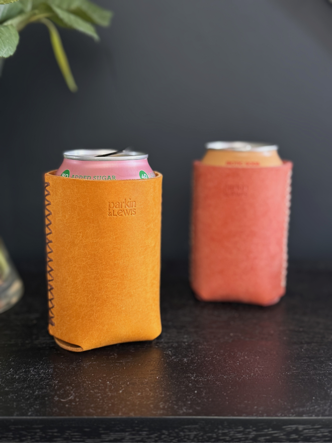 yellow and pink leather drinks sleeve