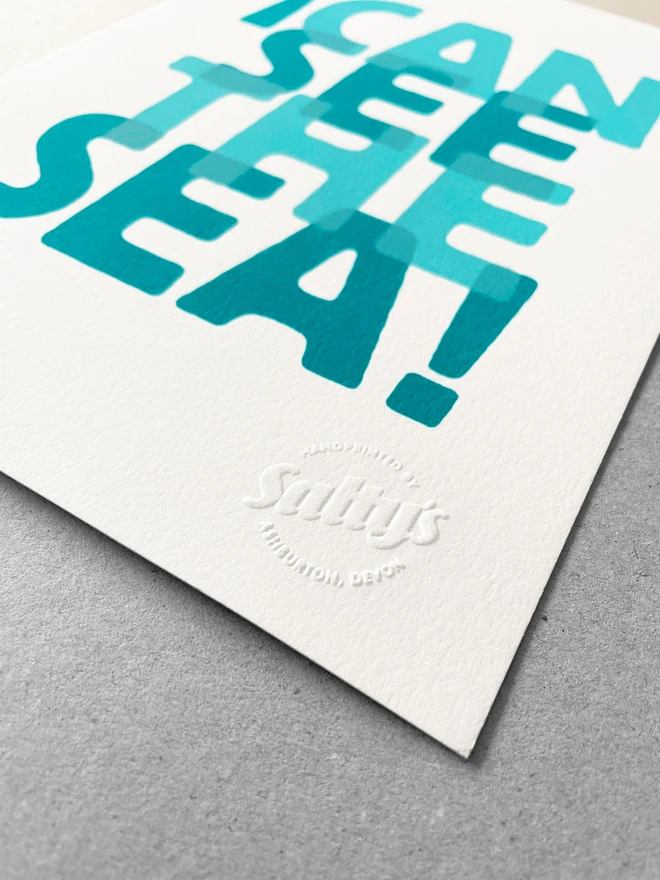 Close up of I Can See the Sea A4 print, the embossed branded stamp in the lower right corner 