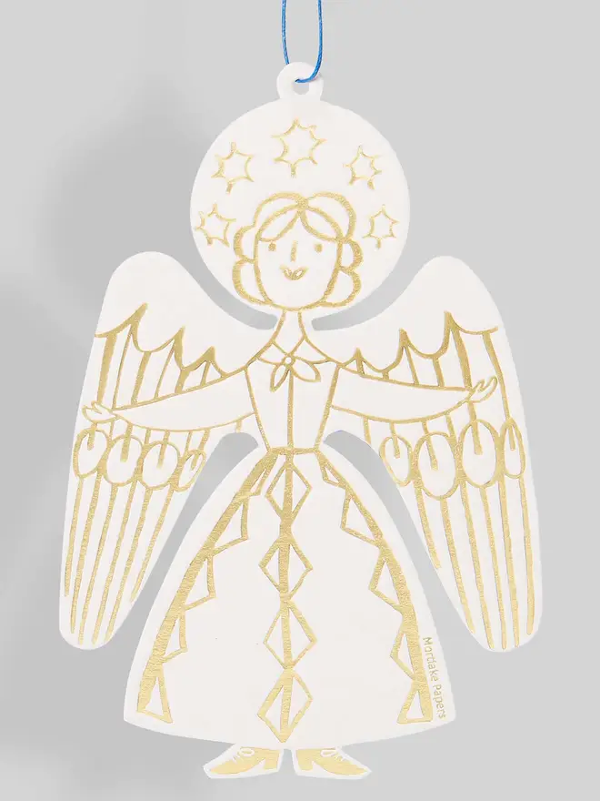 Decorative angel ornament with gold detail on a gray background