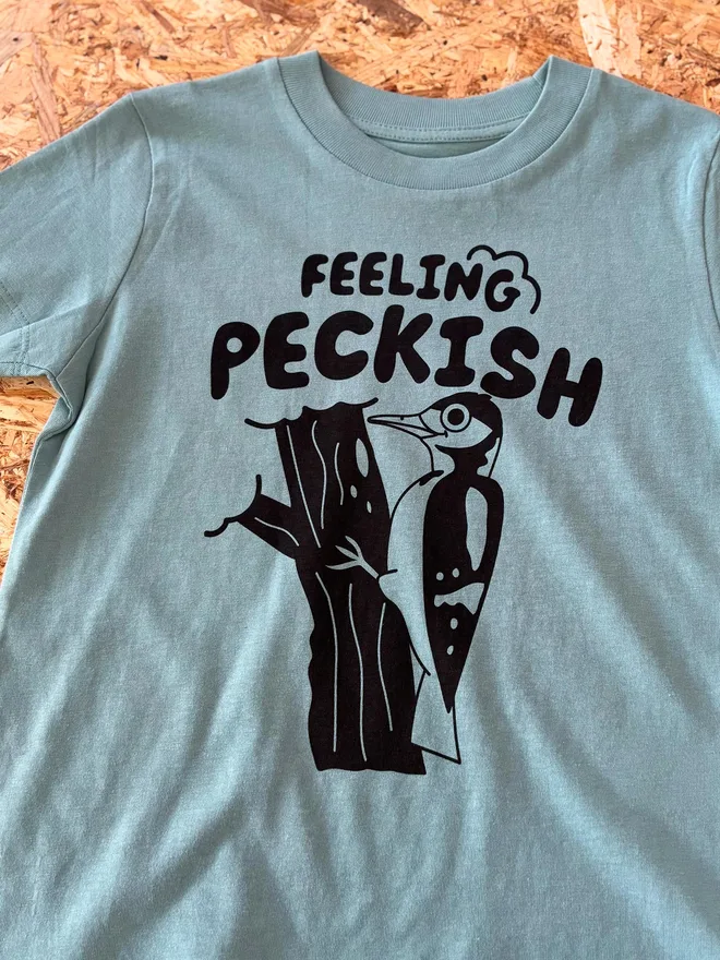 Feeling Peckish Bird Kids T-shirt by hello DODO