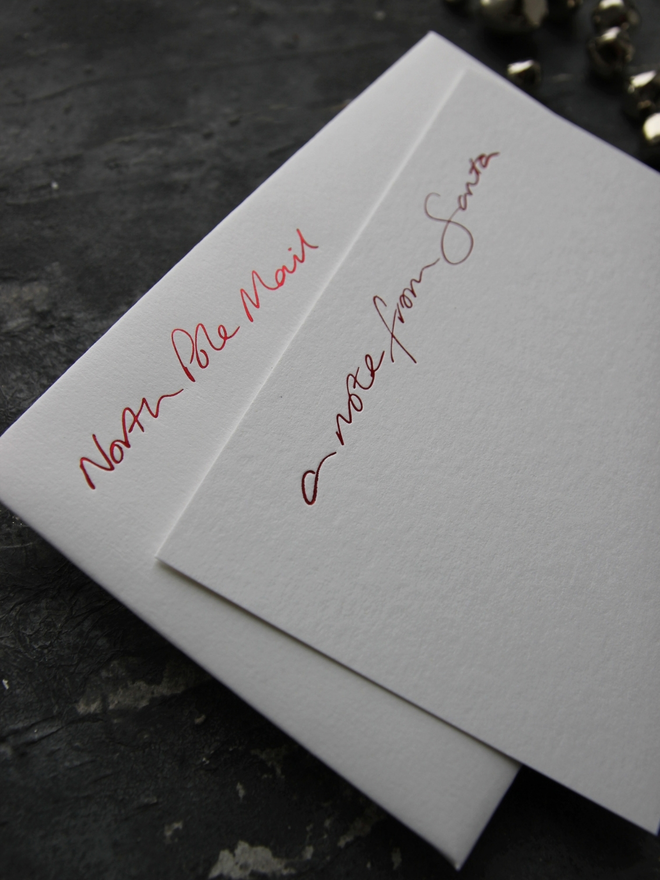 Notecards hand foiled in red says A Note From Santa with an envelope that says North Pole Mail