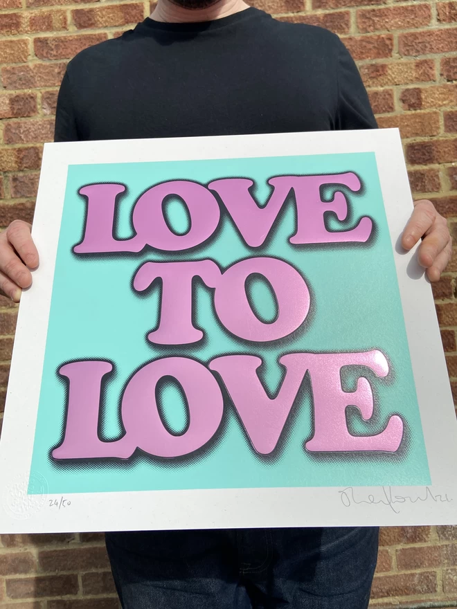 Metallic Hot Foil  "Love to Love" Screen Print in blue. typography says love to love with a drop shadow the print is square 