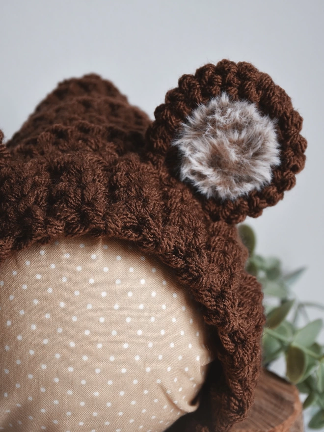 Faux fur in crochet brown bear bonnet