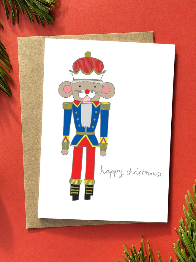 Christmas card featuring a bright and bold mouse king decoration