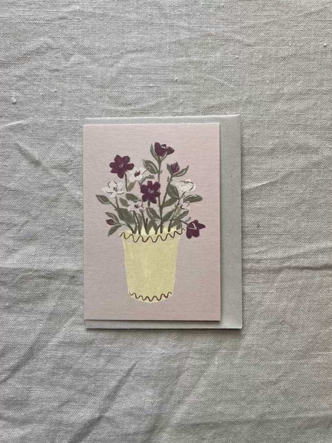 greetings card with hellebore in yellow pot. 