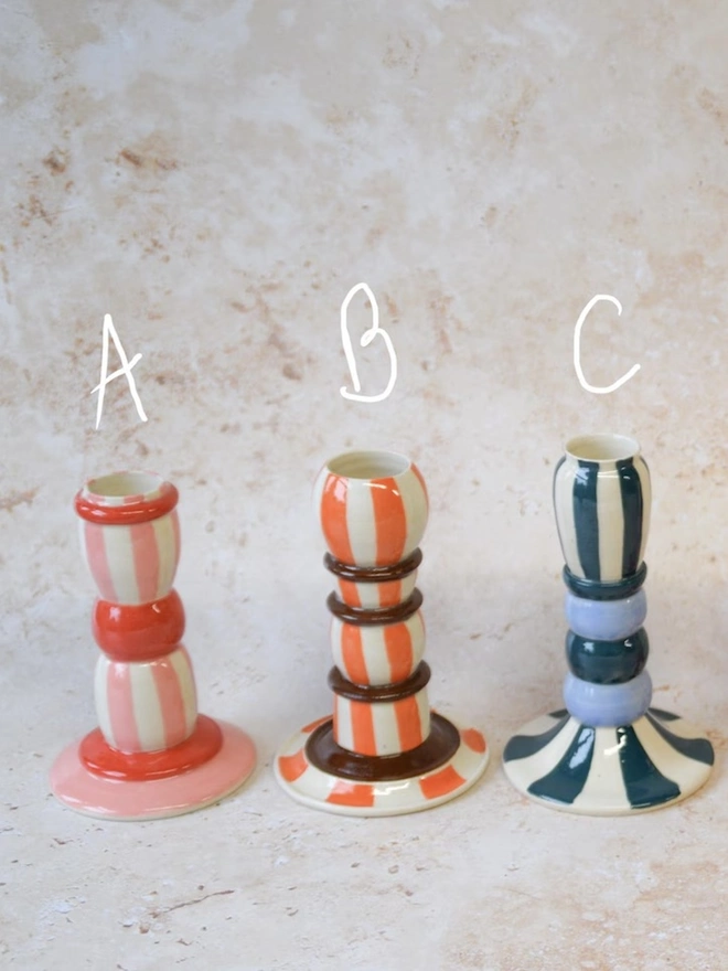 Handmade striped ceramic candlestick holders - red, orange and blue colour options labelled A, B, C