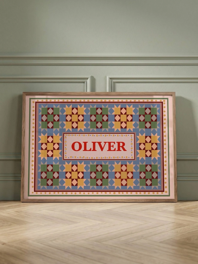 Custom name wall art featuring personalised patchwork print with a child's name taking centre stage, perfect for nursery and children's bedroom decor