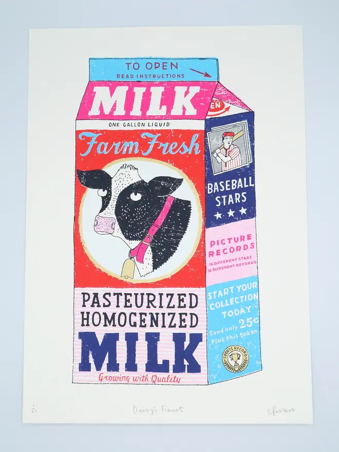 Milk Carton Cow Screenprint Daisy's Finest, a colourful milk carton design on a white screenprint. It sits on a baby blue backdrop. 