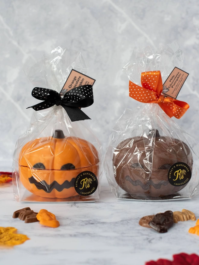 Chocolate pumpkin with assorted halloween chocolate shapes