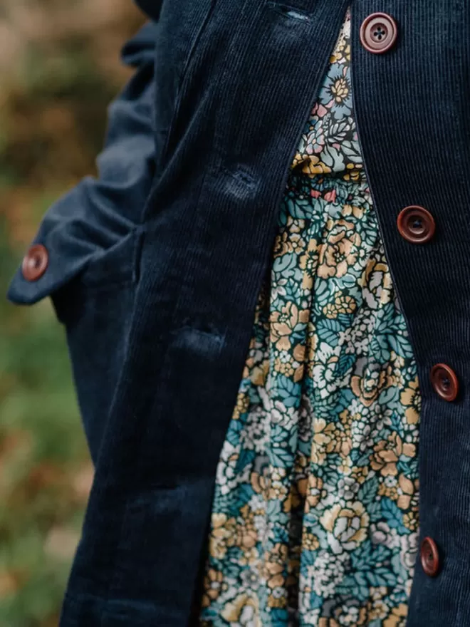 Corduroy jacket in storm blue, pocket and sleeve view.