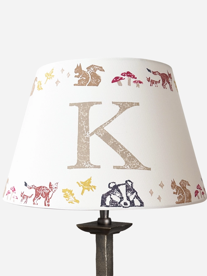 children's lampshade with woodland animals and a personalised letter