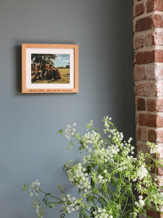 Frame hanging on blue wall