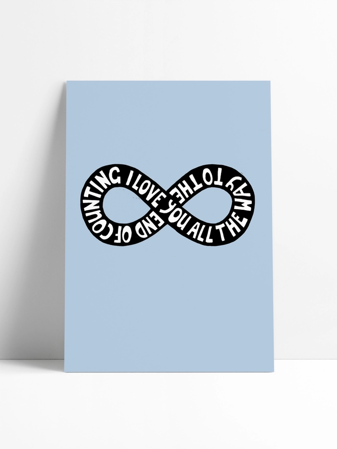 A woodism print that is pale blue with a black infinity design and white typoggraphic words going around it. The words read: I Love You All The Way To The End Of Counting.