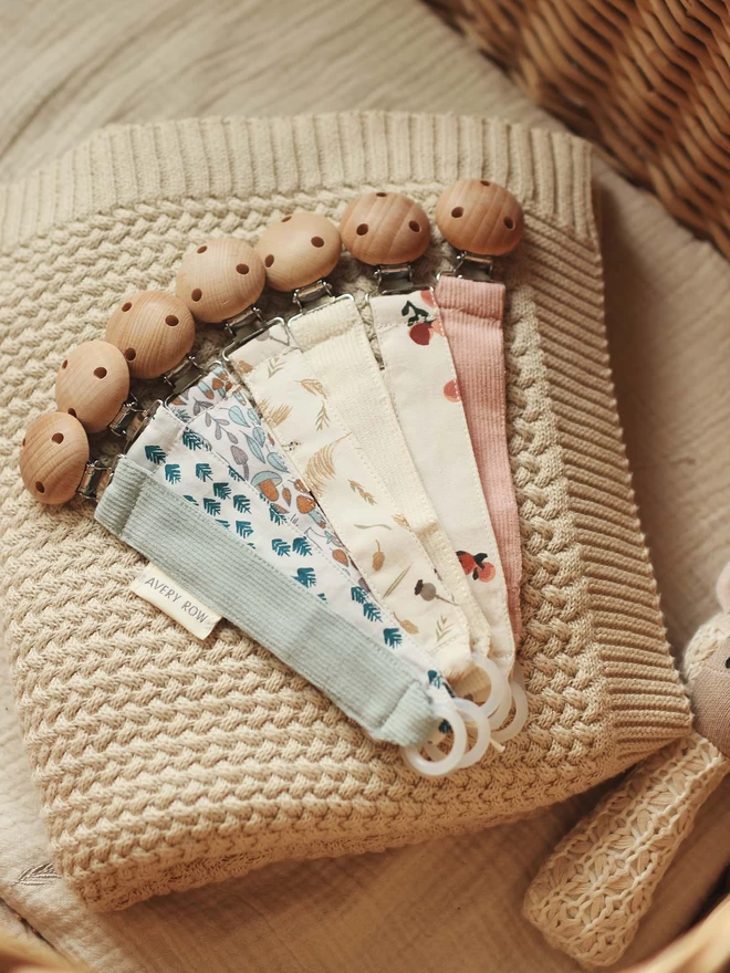 Pacifier holders in different lovely prints