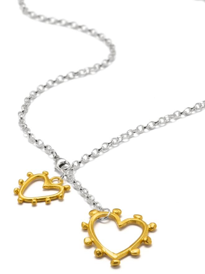 Celebrate connection with the Belong Together Lariat Necklace. Featuring two studded heart charms in mixed metals, this elegant Y necklace symbolises love, belonging and balance. A meaningful keepsake made for gifting or wearing close as a reminder that some things are simply meant to be together.