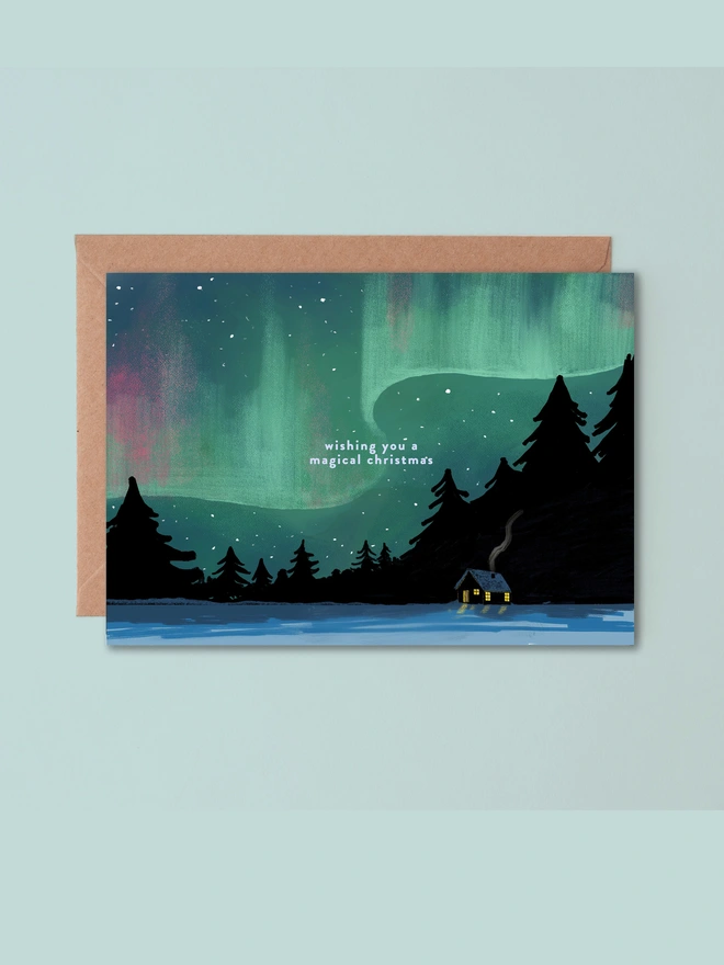 northern lights above a cabin, Christmas card