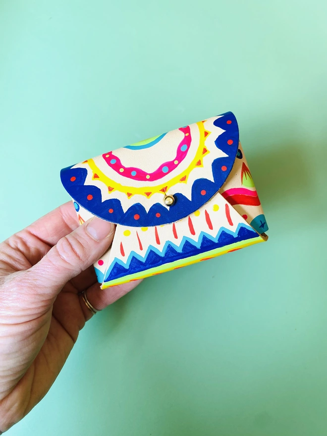 colourful hand painted purse with fastening