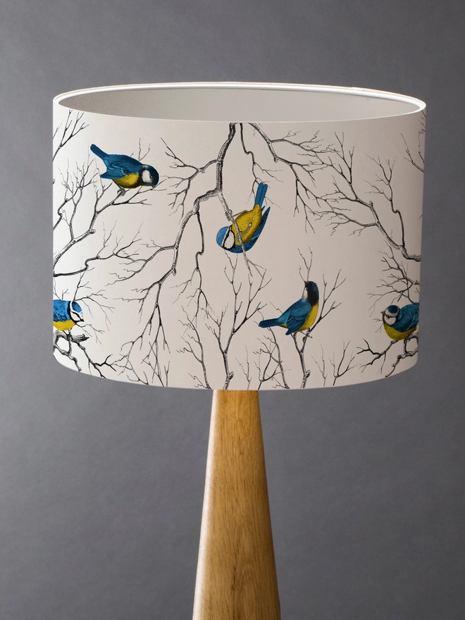 Blue Tit lampshade featuring a playful pattern of colourful British garden birds.