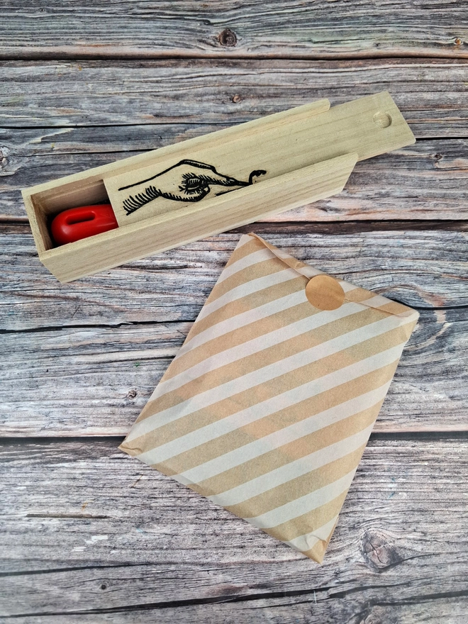 Lino carving and printing kit in wooden box with blue soft lino and versicolor ink pad