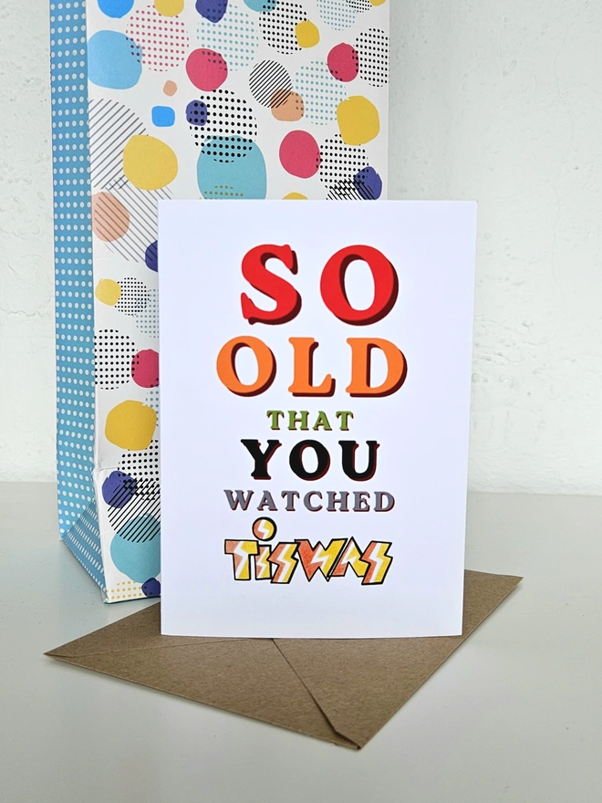A nostalgic card that says So old that you watched Tiswas in colourful retro style fonts on a white background.