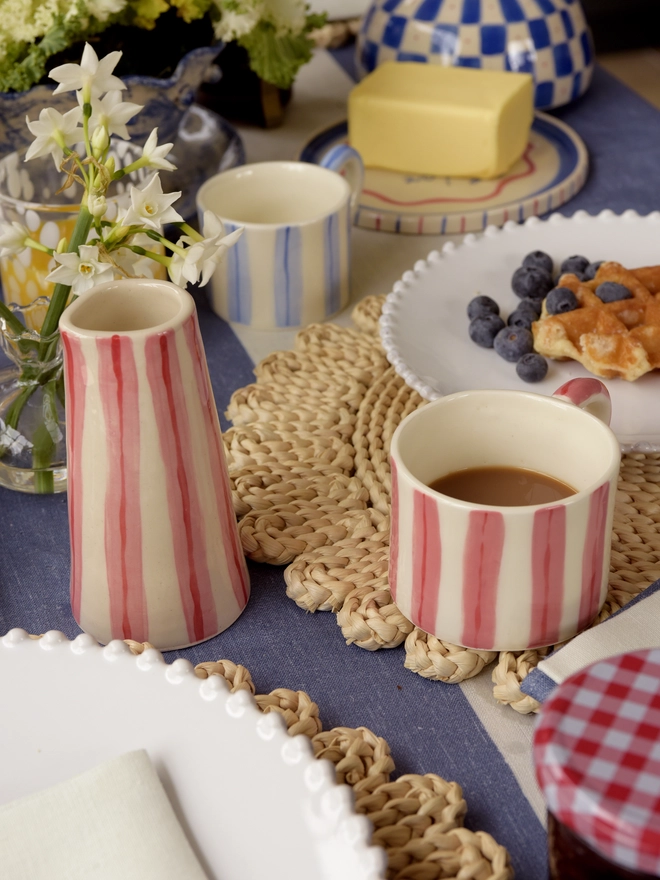 Pink and Red stripes on a ceramic jug