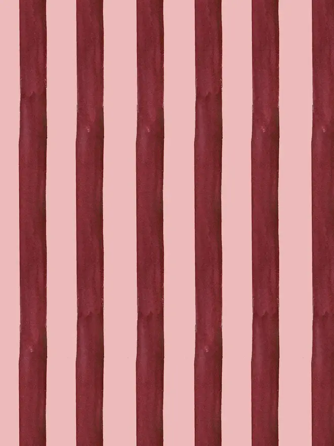 circus stripe painted wallpaper. burgundy and pink striped wallpaper.
