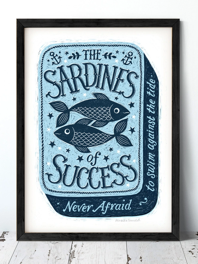 blue sardine tin print in black frame