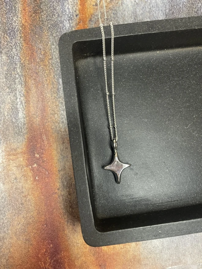 Hand made star charms made from 100% recycled sterling silver, cute gift for girlfriend or wife for Valentine's Day or Mother's Day. Add a personalised initial and send straight to your special someone. Made by Celina C Jewellery, a small business in the UK, find on Holly and Co.