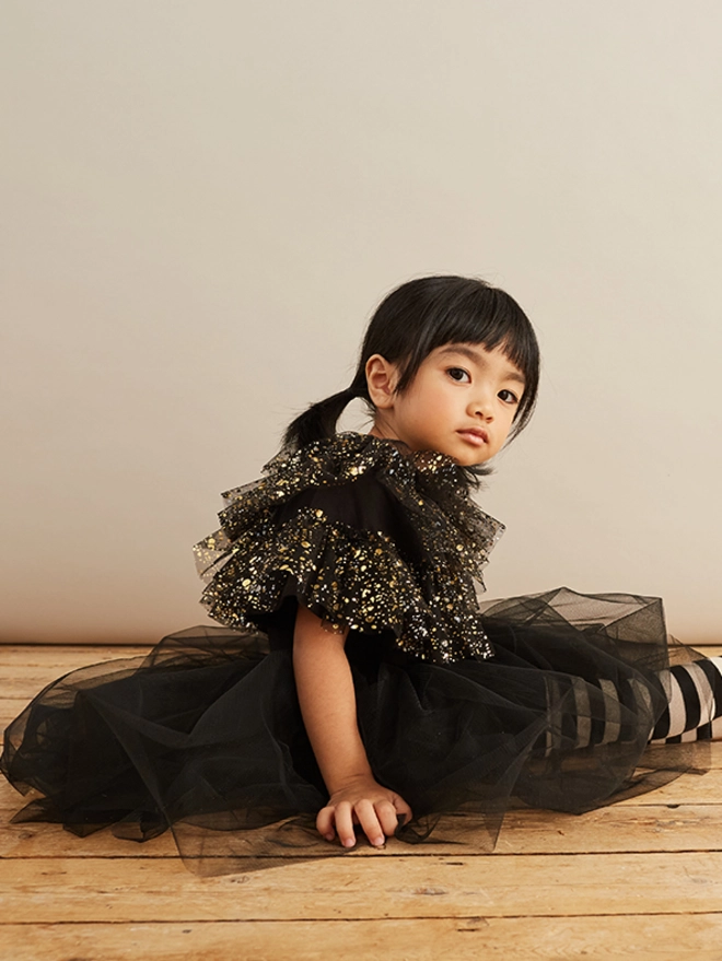 black sparkle cape