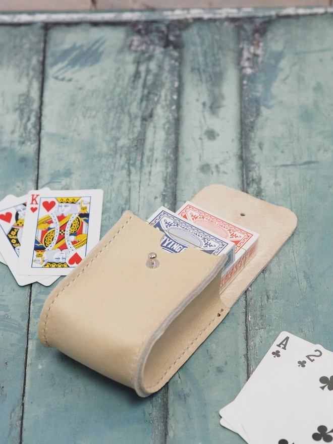 Personalised Leather Double Deck Playing Card Holder. Natural cream case with two packs of playing cards.