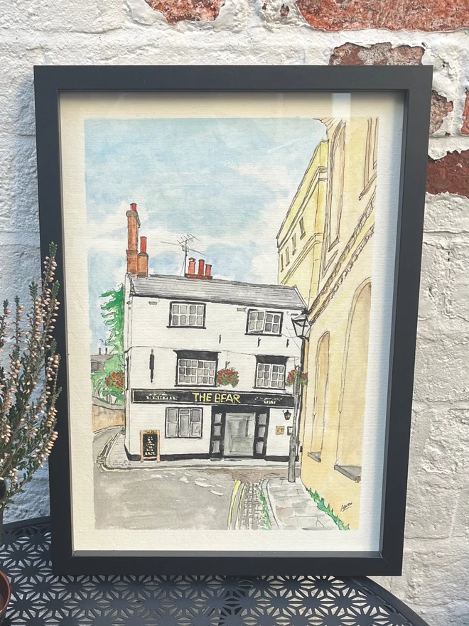 watercolour painting of a Pub, in a black frame