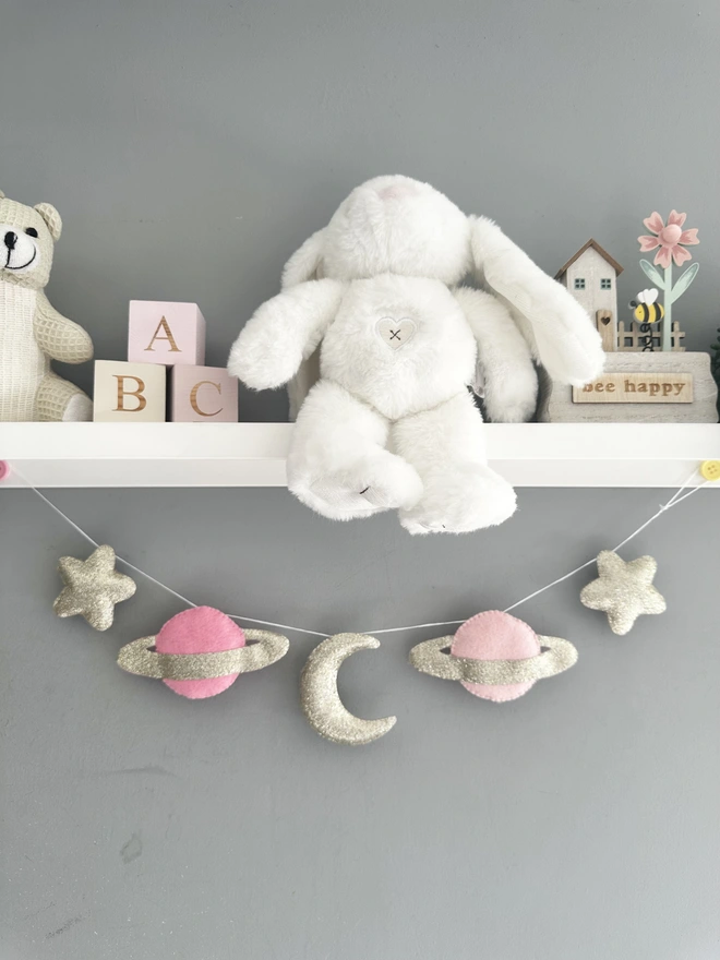 Planet And Stars themed garland hanging in child’s bedroom, nursery decoration, baby gift 