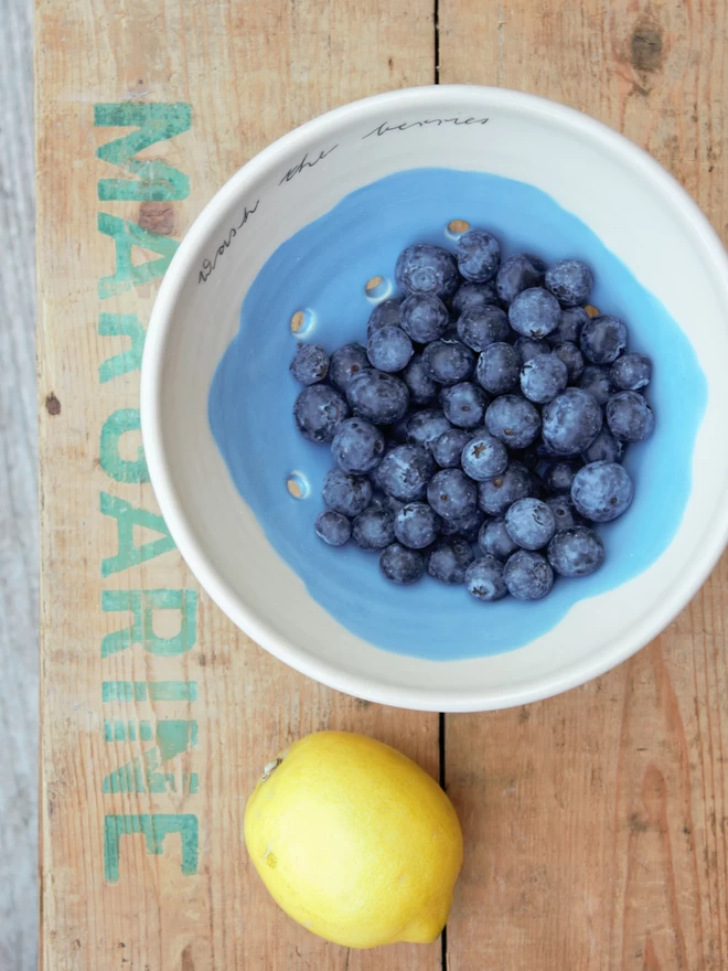 berry bowl with blueberries and lemon