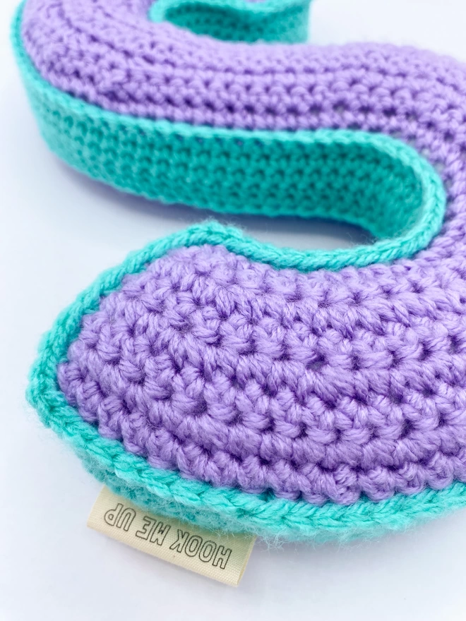 Crocheted S Cushion in Lilac and Teal