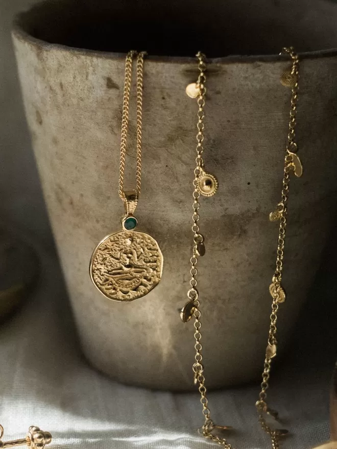 Lakshmi coin pendant with mini coin choker on clay pot