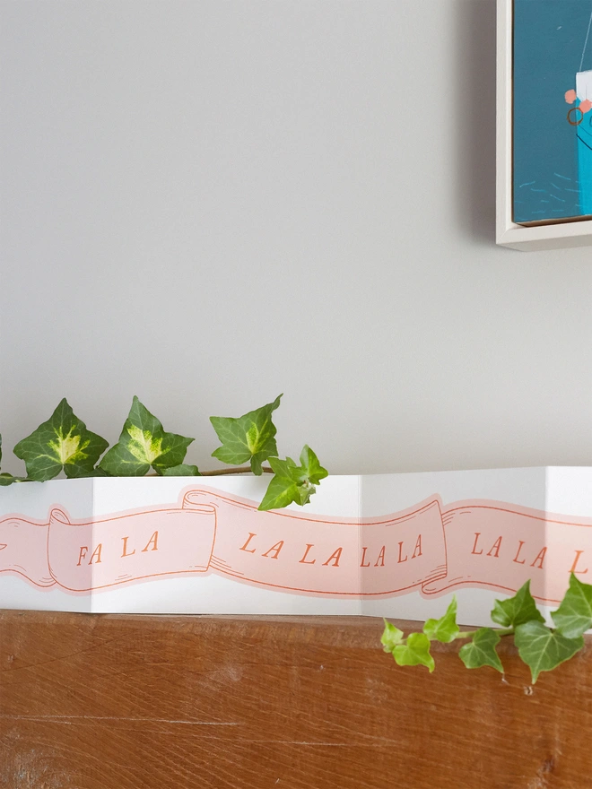 giant concertina christmas card decoration displayed on a shelf