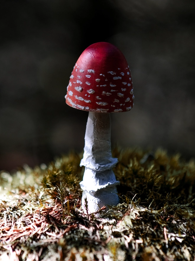 Handmade wooden toadstools and mushroom decorations inspired by enchanted woodland walks