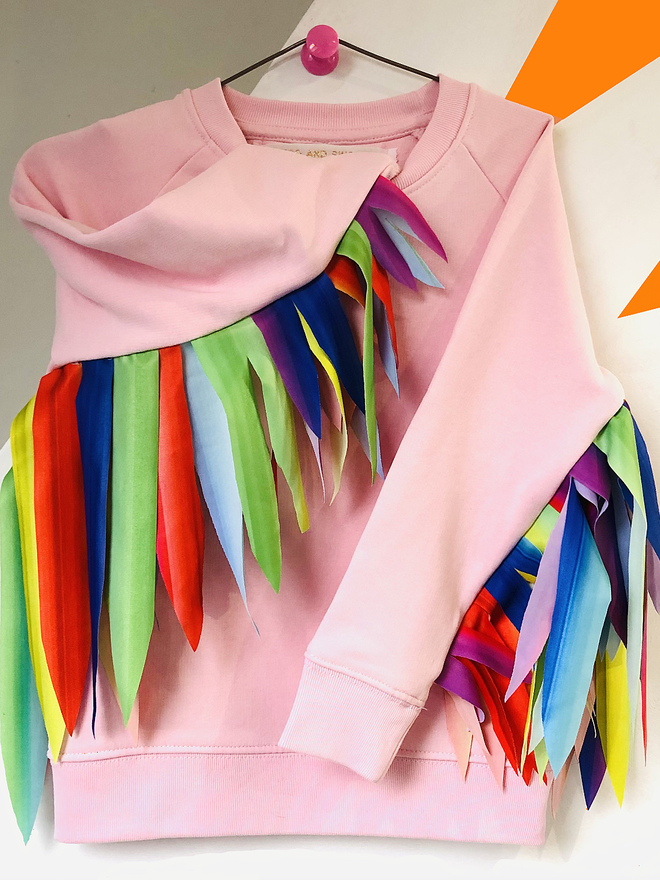 Candy Pink Organic cotton Sweatshirt with long sleeves and Rainbow wings made from Econyl